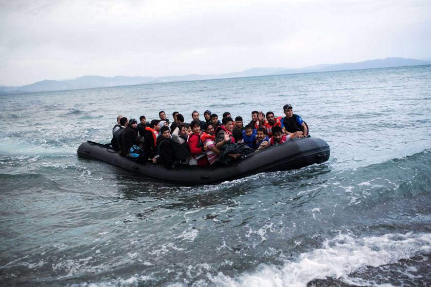 TOPSHOTS A dinghy overcrowded with Afghan immigrants arrived on a beach on the Greek island of Kos, after crossing a part of the Aegean Sea between Turkey and Greece, on May 27, 2015. AFP PHOTO / Angelos TzortzinisANGELOS TZORTZINIS/AFP/Getty Images